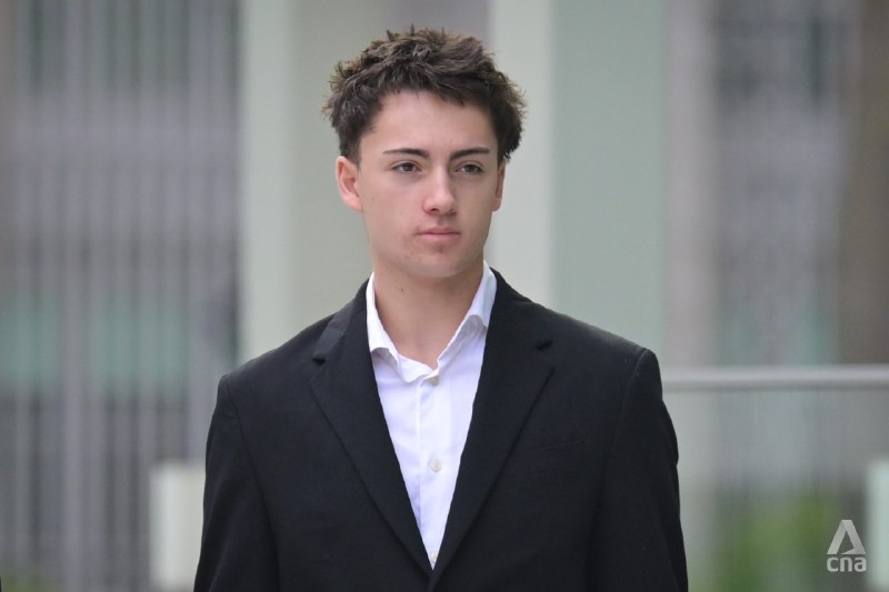 A teenager has been charged over a video he uploaded of himself licking a straw and placing it back into an iJooz vending machine. Didier Gaspard Owen Maximilien, an 18-year-old French national, was given one count each