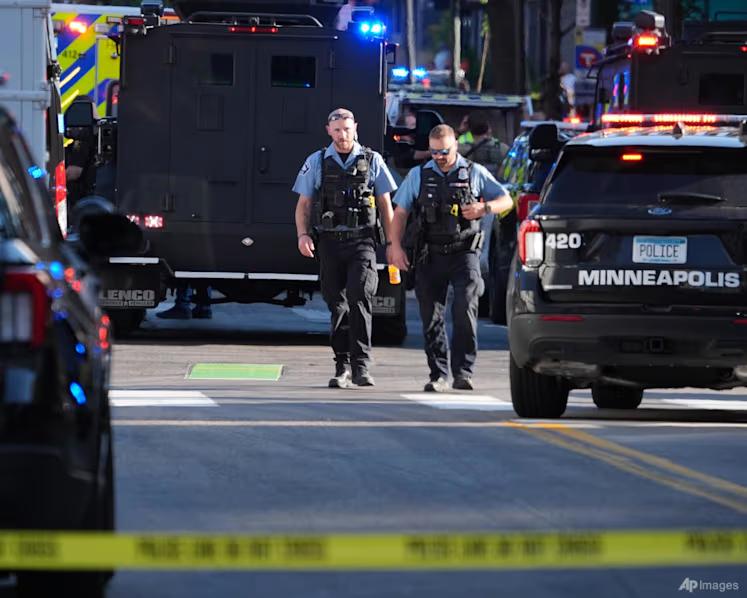 US shooting : Two people have died and several more injured, including three police officers, after a gunman opened fire in Minneapolis.