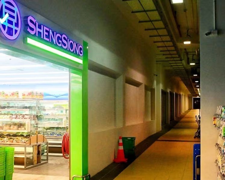 A woman sued Sheng Siong and its employee after allegedly being hit by a trolley carrying bags of rice at an outlet in Clementi.
