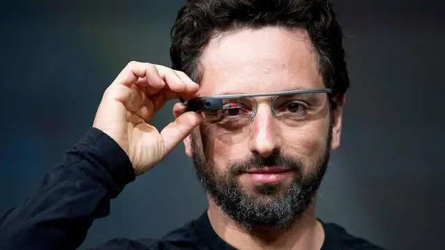 Brin owns up to Glass mistakes while Google plans AI smart glassesGoogle announced on December 8 that it will launch AI-powered smart glasses in 2026 through partnerships with Warby Parker, Samsung, and Gentle Monster, marking its return to the market a decade after discontinuing Google Glass.The new glasses will feature Gemini AI assistant and come in two versions: screen-free audio glasses with speakers, microphones, and cameras, and display glasses with an in-lens screen for navigation and translation, with the audio version launching first.Google co-founder Sergey Brin told Stanford students in late December he 